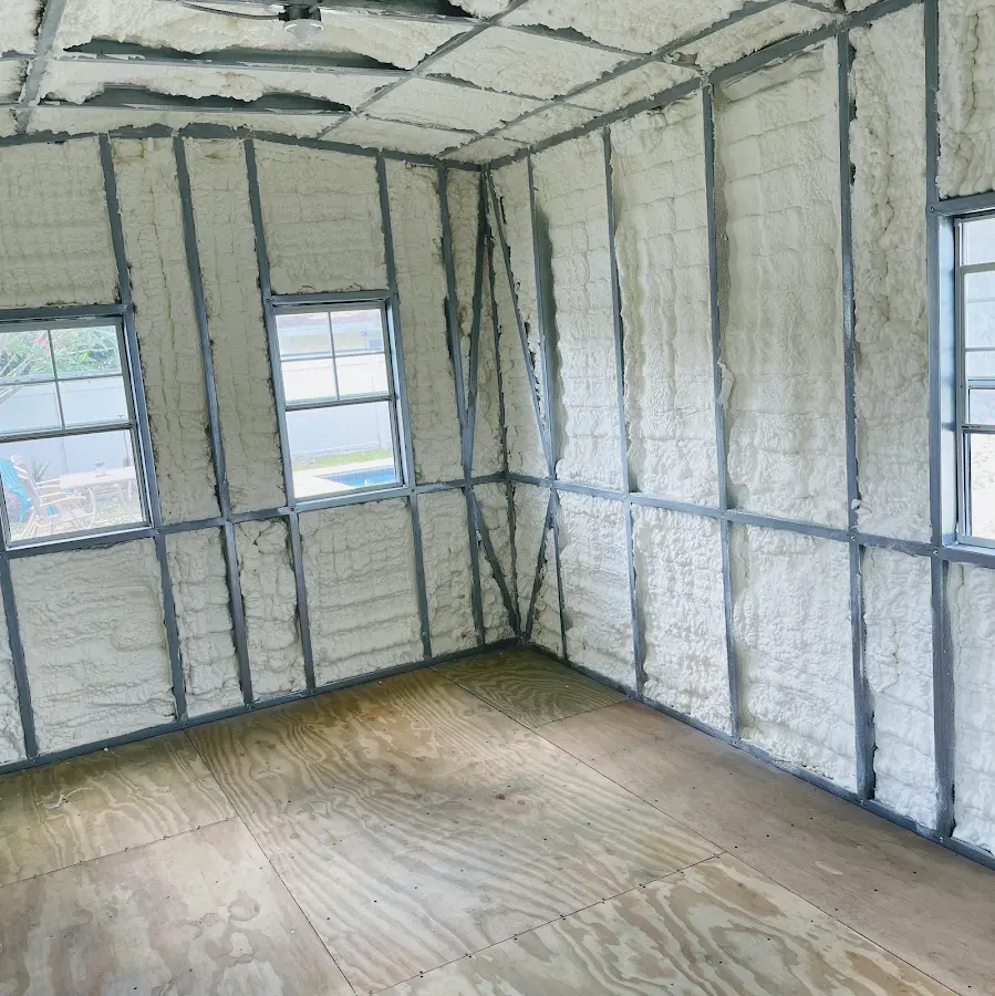Closed-cell spray foam insulation applied to wall cavities in a residential project in Armada